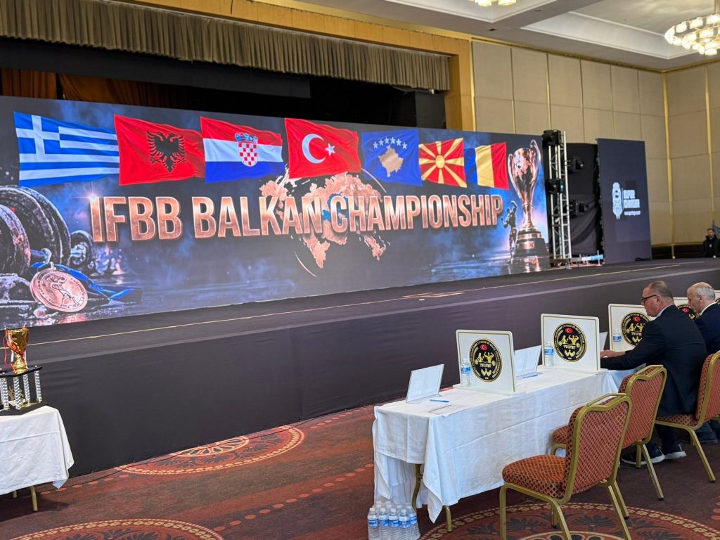 The stage of the 2026 IFBB Balkan Championship in Istanbul, with the flags of the participating countries.